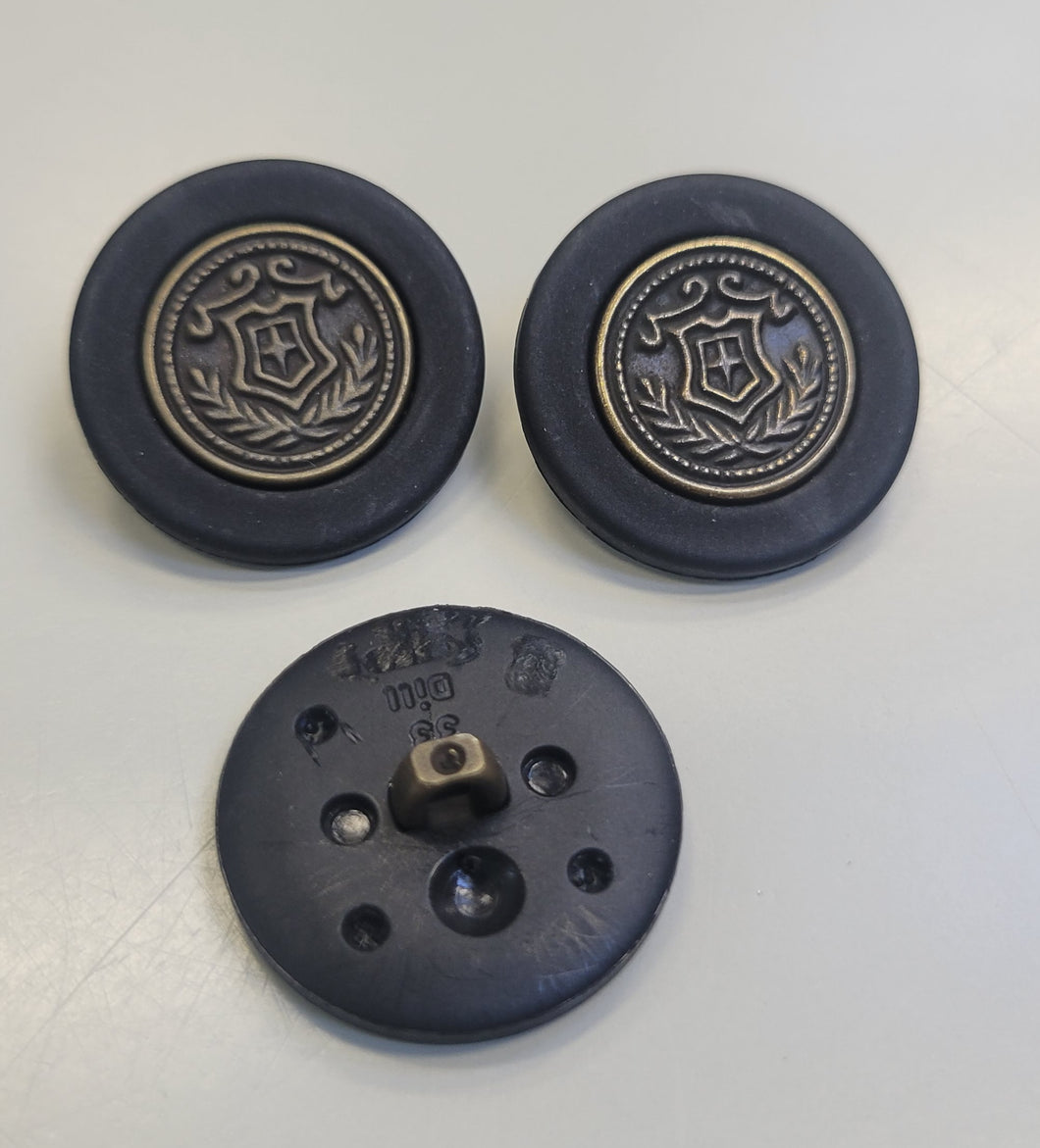 Button w/ Decorative Metal Emblem Design