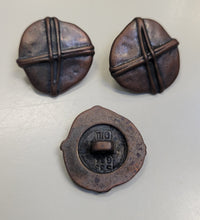 Metal 'X' Design Buttons